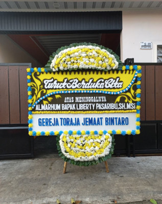 Papan Bunga Duka di Sinar Rambang
